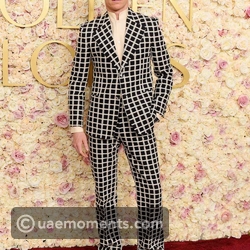 Eddie Redmayne in a checkered statement suit