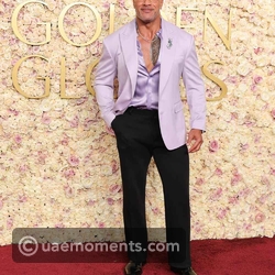 Dwayne Johnson in a lavender blazer
